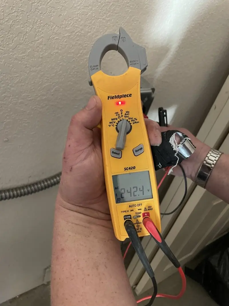Voltage testing with clamp meter during Aluminum Wiring Replacement in Pharr